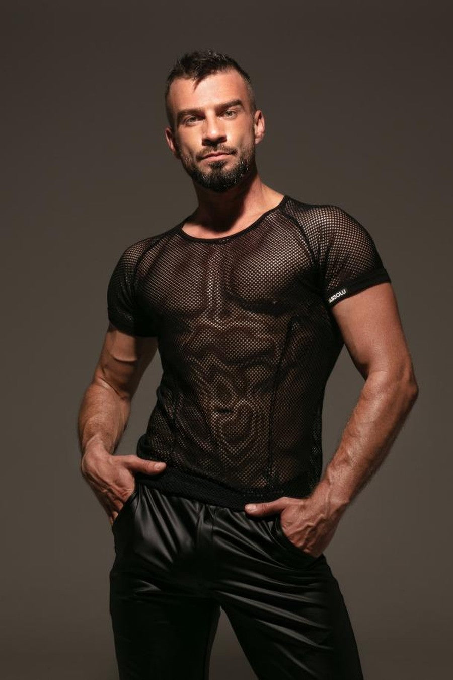Absolu Male mesh T-shirt and faux-leather pants